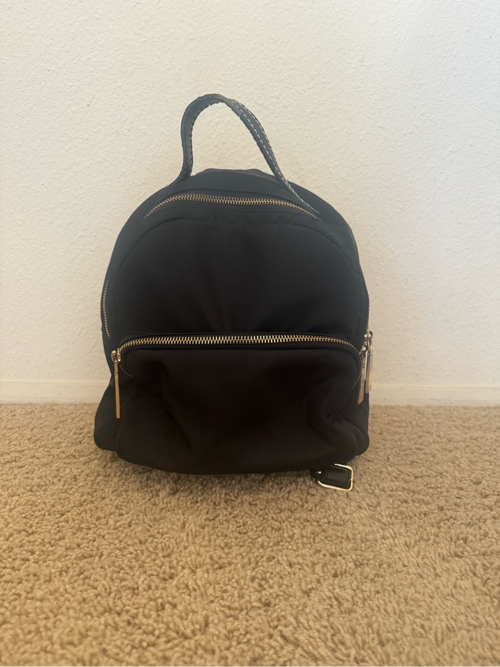 Tommy Hilfiger Black Mini Backpack with Gold Detail